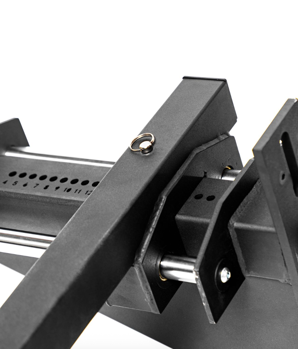 Locking pin securing the adjustable-width dip handles